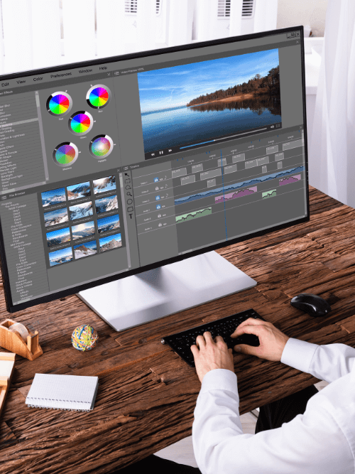 A young video animator doing video animations and editing a video