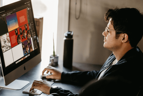 Young boy working on PC and doing graphic designing