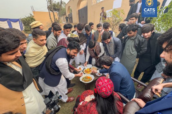 CATS College students enjoying traditional food, a highlight of life for BS degree programs in lahore.