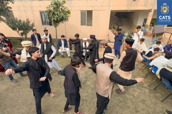 CATS College students gathered around a traditional food stall, highlighting community life for BS degree programs in lahore.
