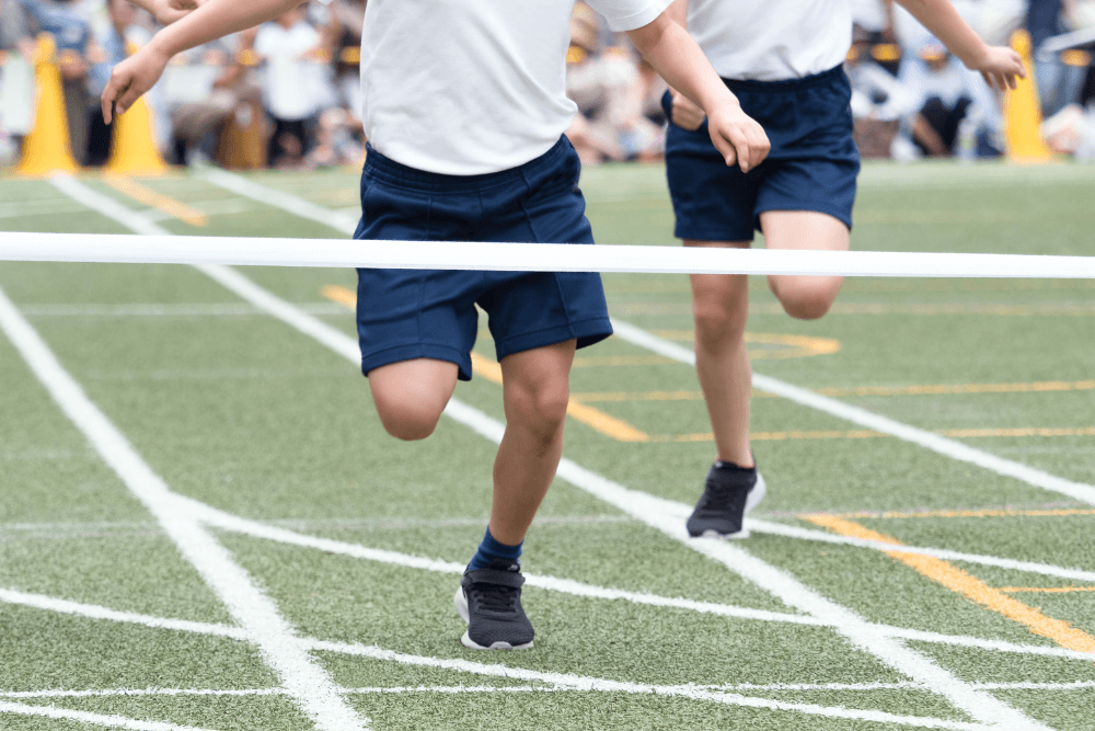Students competing in a track race, symbolizing the competitive edge provided by inter tech courses in Lahore and BS degree programs in Lahore.